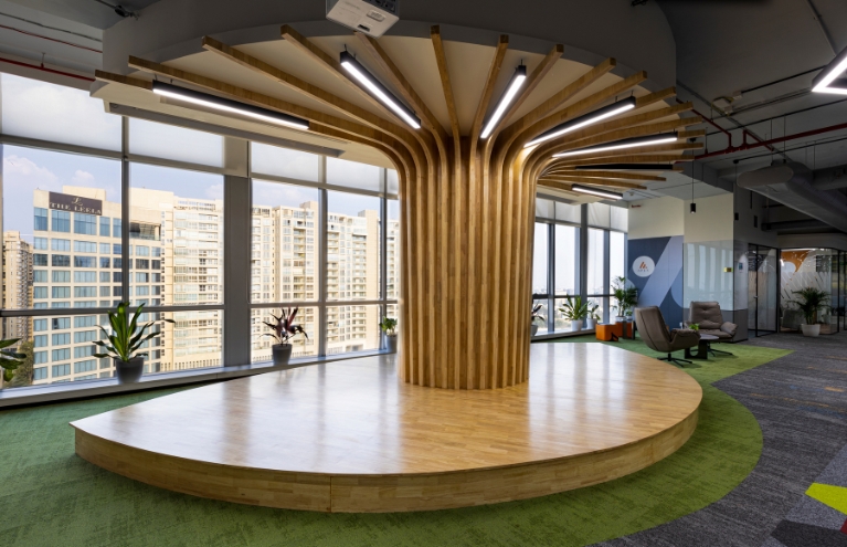 Rubber wood panelling at the Apex Bangalore office adds warmth to the workspace while creating less environmental impact